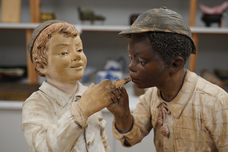 A late 19th century Johann Maresch figure group of two boys smoking. 55cm high. Condition - good